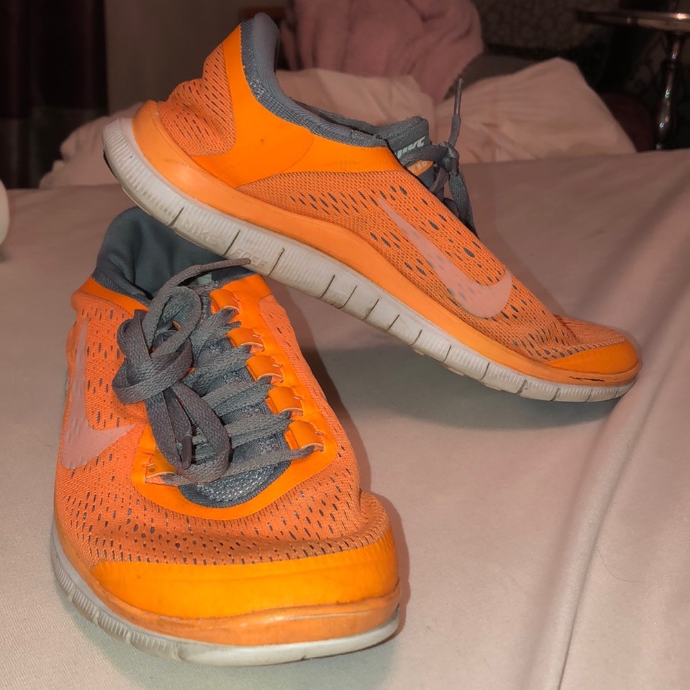 Womens orange nike running shoes